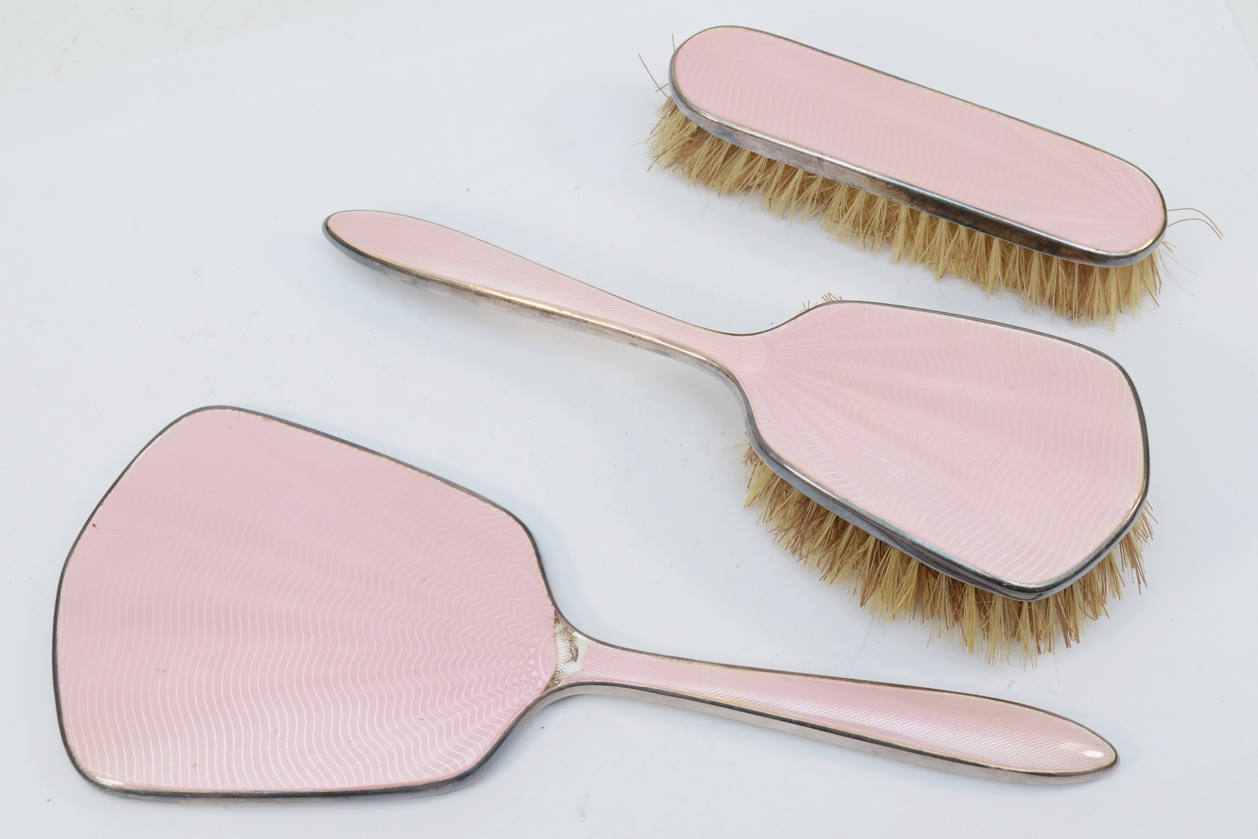 An Art Deco silver plated pink guilloche enameled dressing table set, cased. - Image 2 of 2