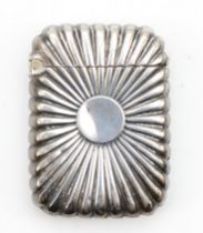 A Victorian silver Vesta case, 4.5 x 3.5cm, with embossed sun burst decoration, Birmingham 1888,