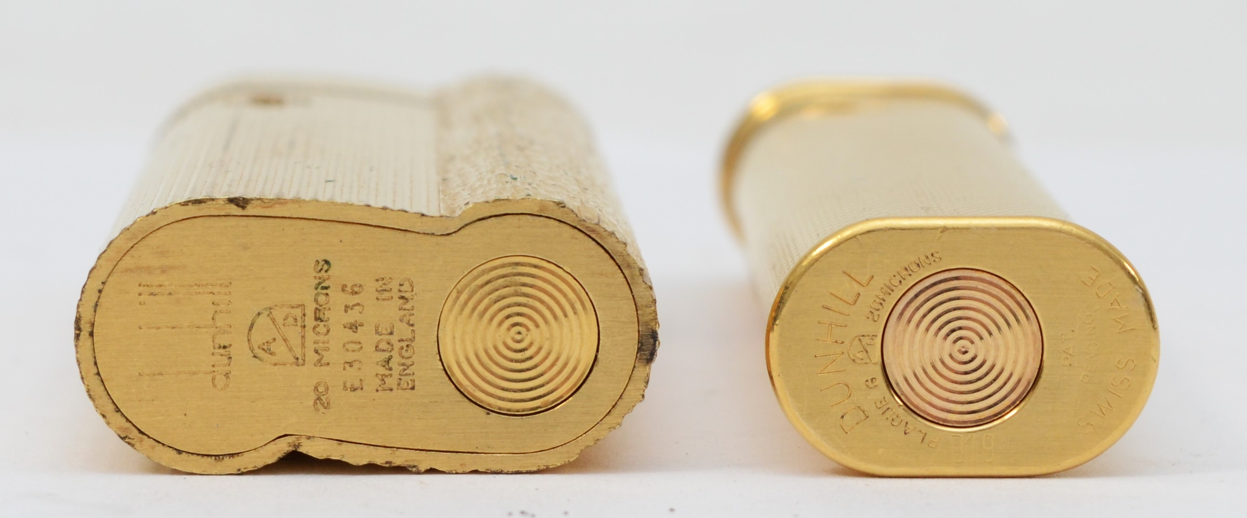 Dunhill, Two textured gold plated gas lighters, No E30436, No 019. - Image 3 of 3