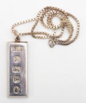 An Elizabeth II Silver Jubilee silver ingot, 40 x 13mm, 37gm, on box link chain.