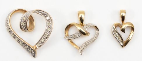 Two 9ct gold diamond heart shaped pendants, largest 18mm, 2.6gm, and a gold and diamond heart
