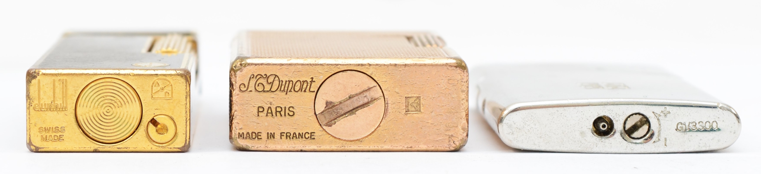 Dunhill, A black and gold plated rectangular gas lighter, 6.5cm, together with a Dupont french - Image 4 of 4