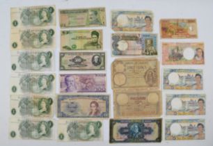 A group of world paper currency to include a 20 francs, Tunisia 1938 bank note.