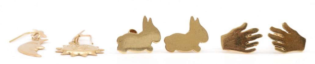 A pair of gold sun and moon drop earrings, 30mm, A pair of rabbit ear studs and a pair of hand
