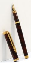 Waterman, a red bodied Ideal fountain pen with 18k gold nib, 14cm.