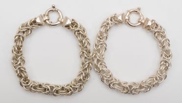 Two silver fancy link bracelets, 21cm, 57gm.