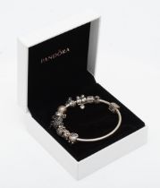 Pandora, a silver charm bangle, 62mm, 45gm.