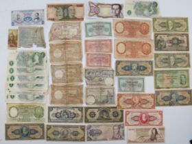 A collection of world paper currency to include, French, Brazil and Argentina.