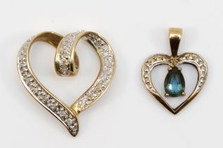A 9ct gold diamond heart shapped pendant, 18 x 22mm, and another 9ct gold topaz pendant, 2.9gm.