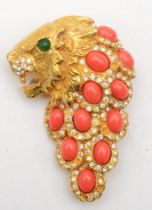 Kenneth Jay Lane, A gold plated rhinestone set Lion head brooch, 60 x 45mm.