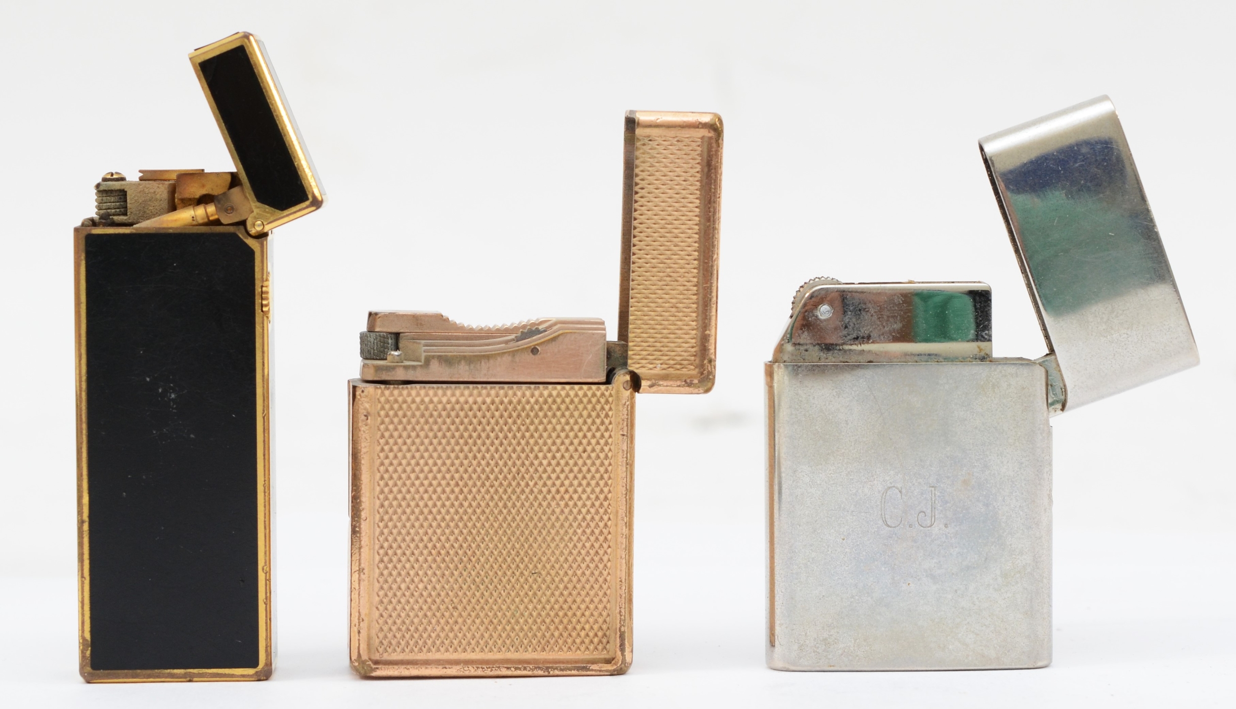 Dunhill, A black and gold plated rectangular gas lighter, 6.5cm, together with a Dupont french - Image 3 of 4