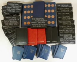 Eighteen Royal Mint 1971 cased proof coin sets and Britain's first decimal coin sets, including