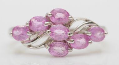 A 9ct white gold pink sapphire cluster ring, N-O, 2.7gm.