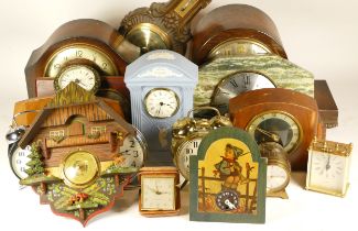 A collection of mid 20th century and later mantel clocks, anniversary clocks, carriage clocks, and