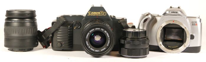 Two Canon cameras comprising of a boxed Canon EOS 300V with lens (working) together with a a Canon