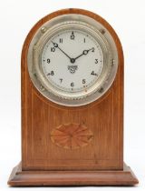 A Smiths of London Edwardian inlaid walnut dome topped mantle mounted car clock, the dial with black