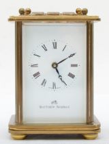 A 20th century Matthew Norman brass and four glass corniche cased carriage clock, the white dial