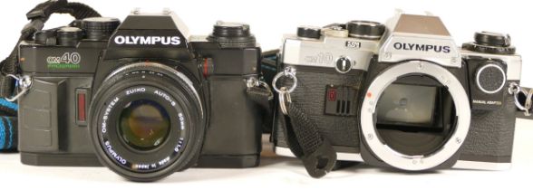 Two Olympus cameras comprising of Olympus OM10 (working) and an Olympus OM40 Program with lens (