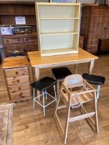 A group of furniture items, to include a pine dining table, a pine four height chest of drawers,