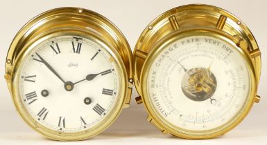 A German Schatz brass bulkhead clock, the eight day movement striking on bell, 17cm diameter,