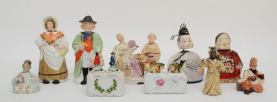 A collection of 19th century and later bisque porcelain 'nodding' figural groups. (10)