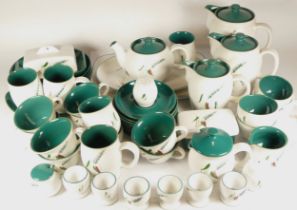 Denby, a quantity of Green wheat tea ware to include cups and saucers.