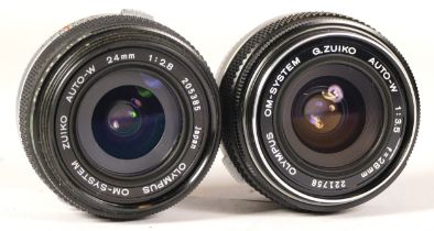 A boxed Olympis OM 28mm F3.5 lens (boxed and working) together with a Olympus OM 24mm lens (