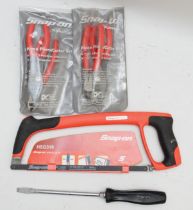 Snap On, Hacksaw HSG319, two sets of pliers and a screw driver