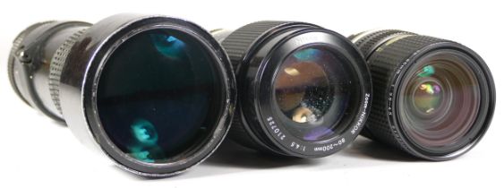 Three Nikon lenses to include boxed Nikkor 28-85mm f/3.5-f4.5 (mechanically working but requires a