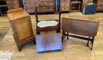 An Edwardian mahogany console table, together with a bedside cabinet, a bidet, a towel rail and a