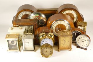 A collection of early 20th century and later mantel clocks, anniversary and carriage clocks,