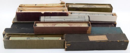 A collection of vintage pianola music rolls.
