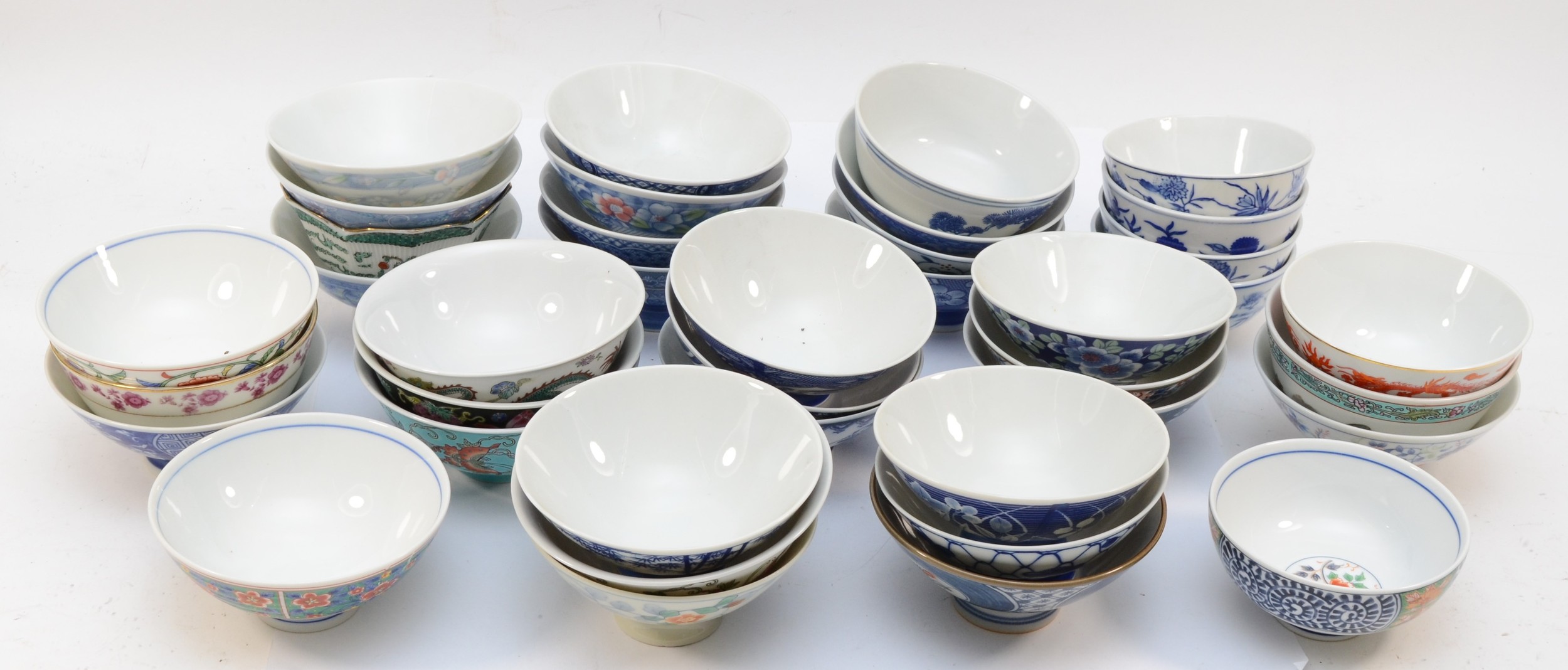 A collection of 20th century Chinese tea bowls.