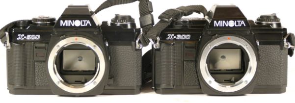 A Minolta X-500 All Black camera (working) together with with a Minolta X-300 All Black camera (