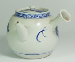 A Japanese Meiji period porcelain teapot, early 20th century, decorated with foliage, 12cm tall.