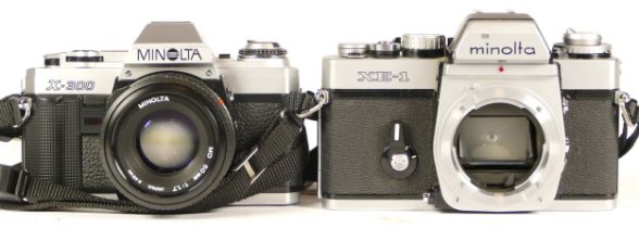 A Minolta X-300 camera complete with lens and case, (working with haze in lens) together with a