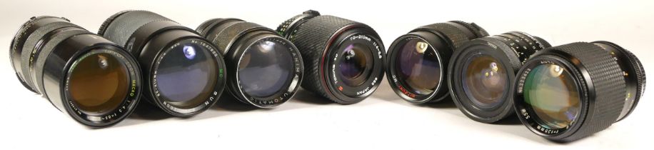 Seven assorted camera lenses (untested)