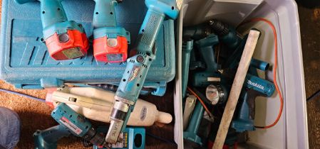 A quantity of used Makita cordless drills and torches, 3 empty cases