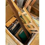 A large quantity of artist supplies to include paint, loose paper, brushes and frames.