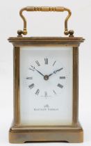 A 20th century Matthew Norman corniche brass cased and four glass carriage clock, with swing handle,