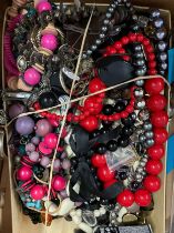 A collection of costume jewellery to include beaded necklaces, earrings and bracelets, together with