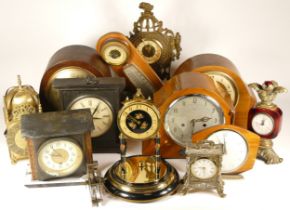 A collection of mid 20th century and later mantel clocks, lantern clocks, carriage clocks and