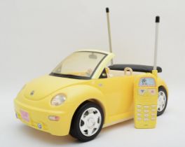 Barbie, a Mattel yellow VW Beetle convertible with telephone remote control