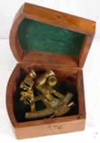 A late 20th century Stanley of London walnut cased brass sextant, 12.5cm long.