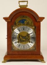 A 20th century Dutch mahogany bracket clock, the brass dial with silvered chapter ring and moon