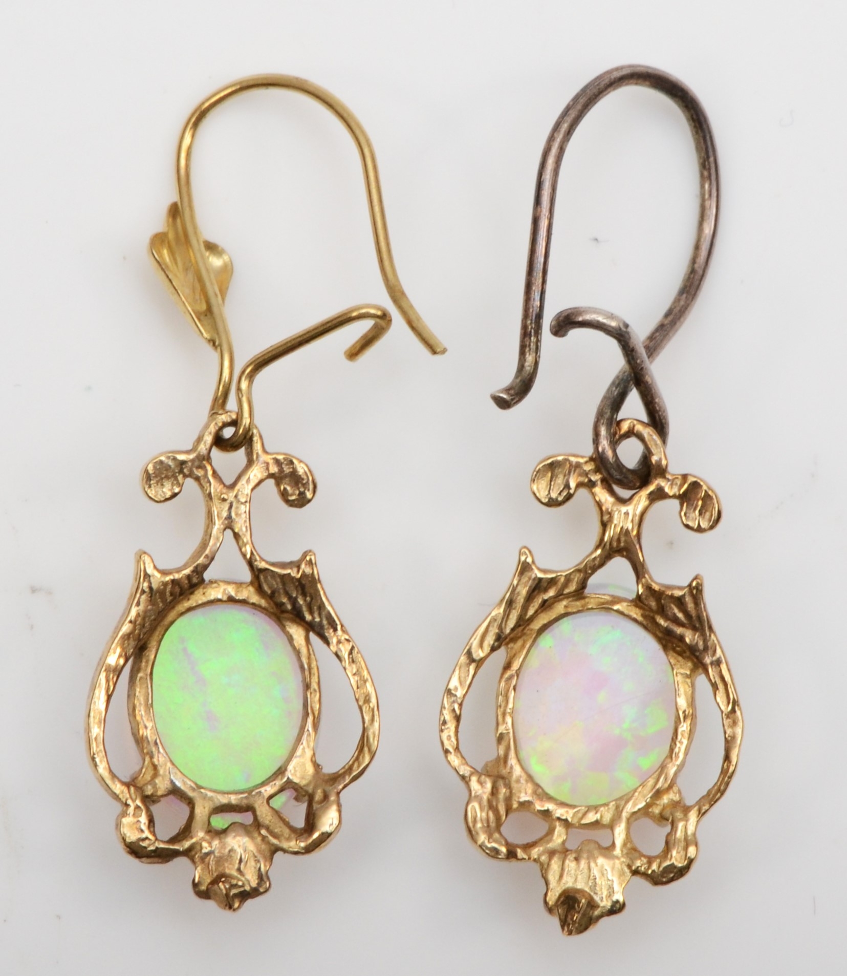 A pair of unmarked gold synthetic opal drop earrings, one with replaced silver post, 17mm, 2.2gm. - Image 3 of 3