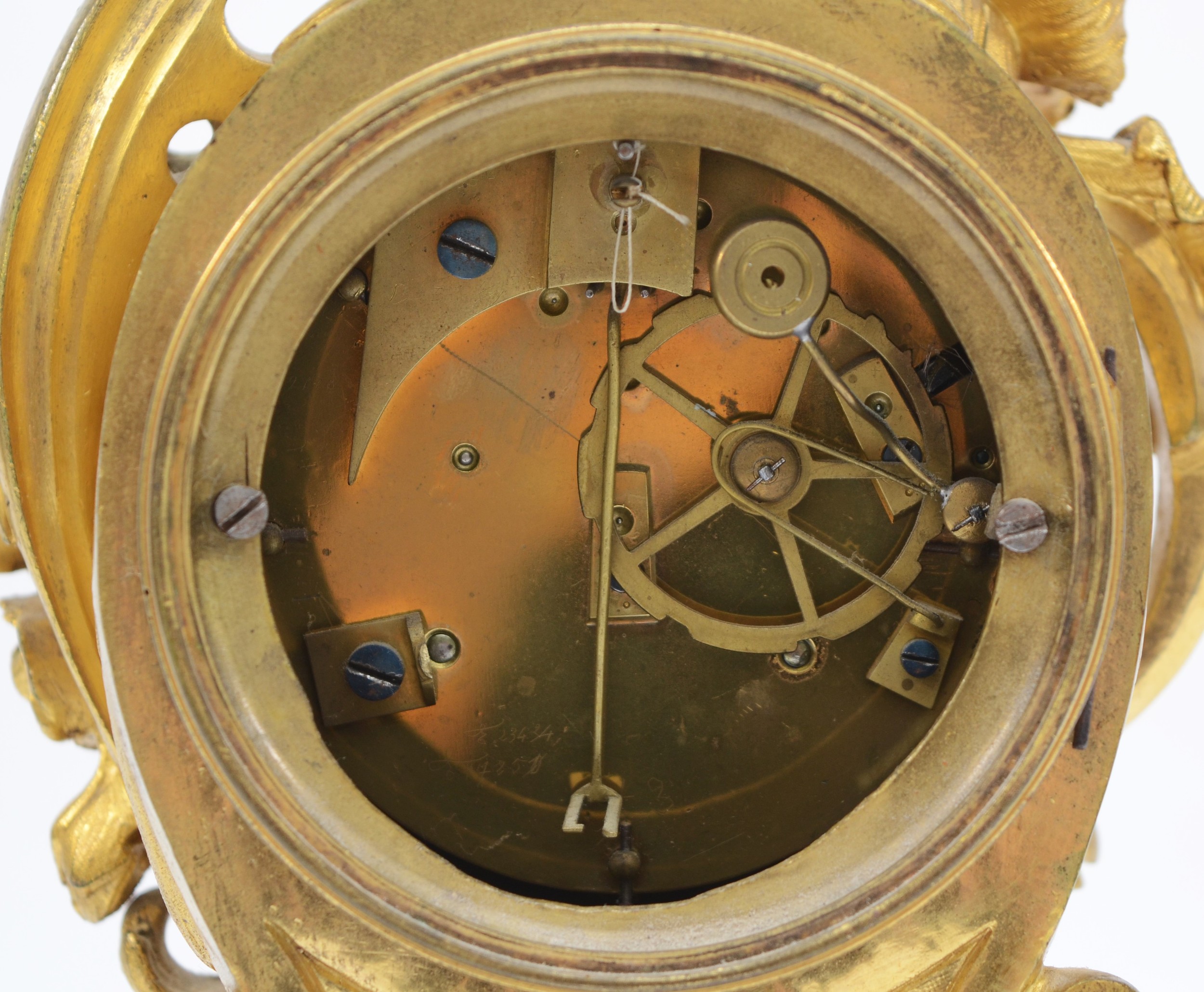 A late 19th century, probably French gilt brass mantle clock, the gilt dial with applied enamel - Image 4 of 6