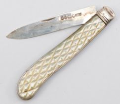 A Victorian silver and carved mother of pearl fruit knife, Sheffield 1863, blade 62mm