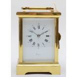 Worcester, a contemporary heavy brass and four glass corniche cased carriage clock, with swing