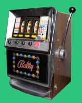 Bally, an electromechanical three reel and hold slot machine, c.1965/70, 48 x 46 x 67cm, 2p play.